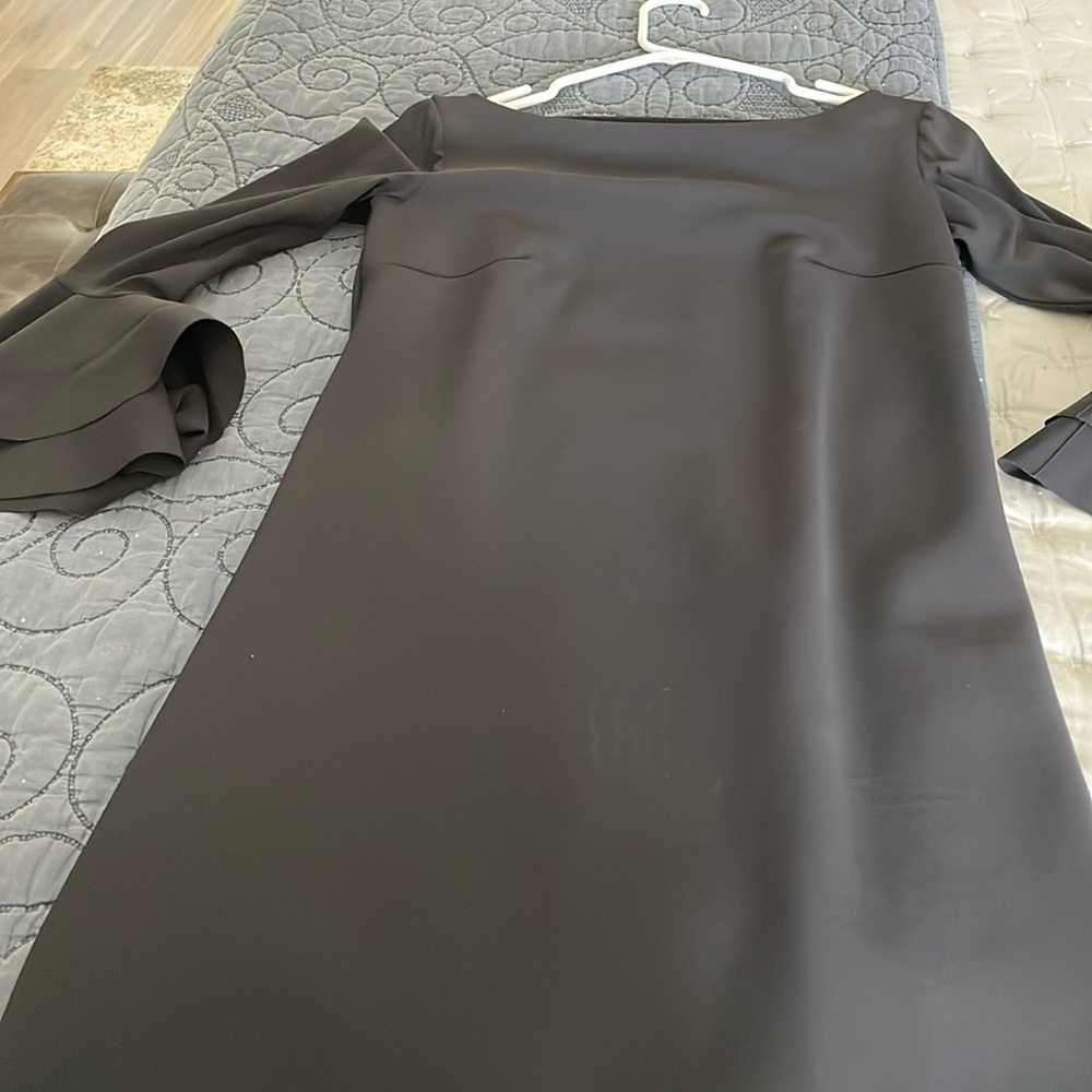 Black cocktail dress with bell sleeves